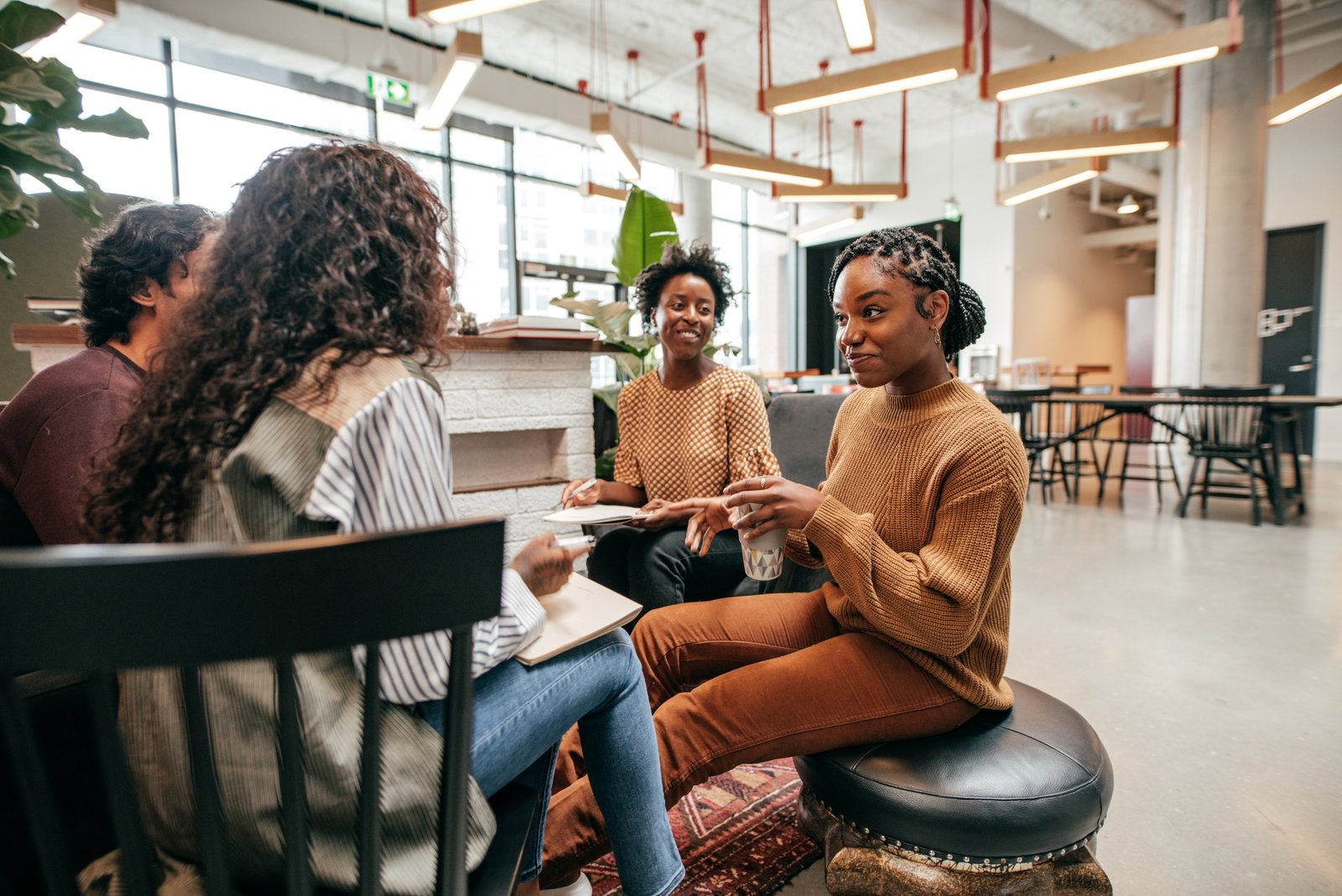 Group discussion in a modern café.